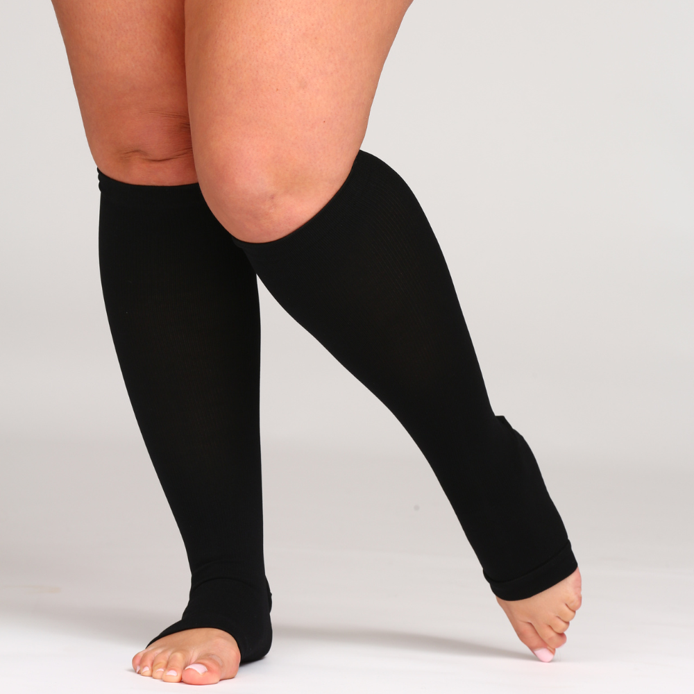 Black open toe knee high compression socks, side view
