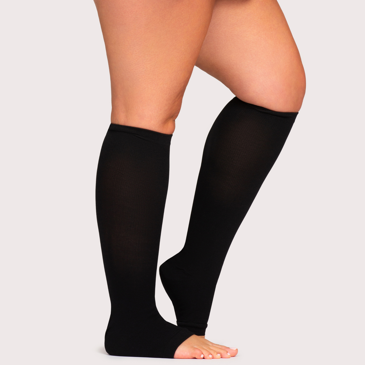 Black open toe knee high compression socks with closed heel