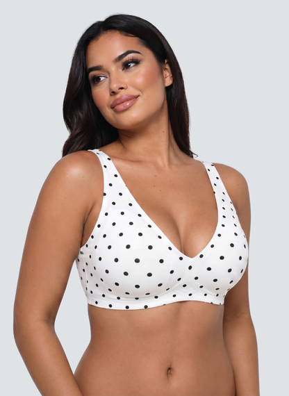 White polka dot wireless plunge bra in ivory with black dots