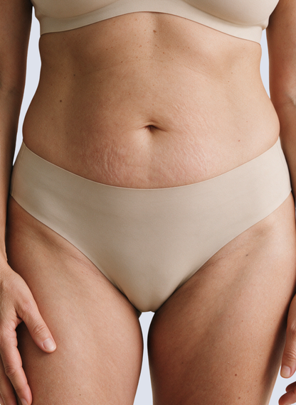 Nude seamless mid rise knickers, front view