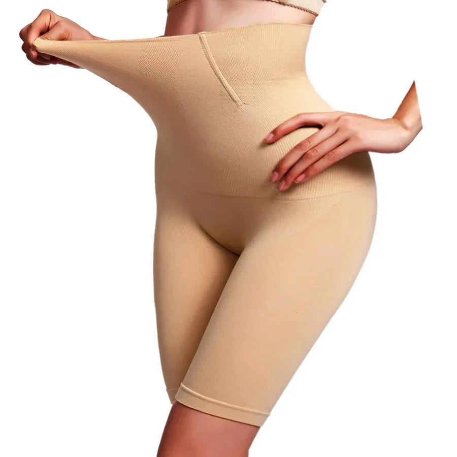Nude high waisted shapewear shorts worn, showing the stretch of the waistband