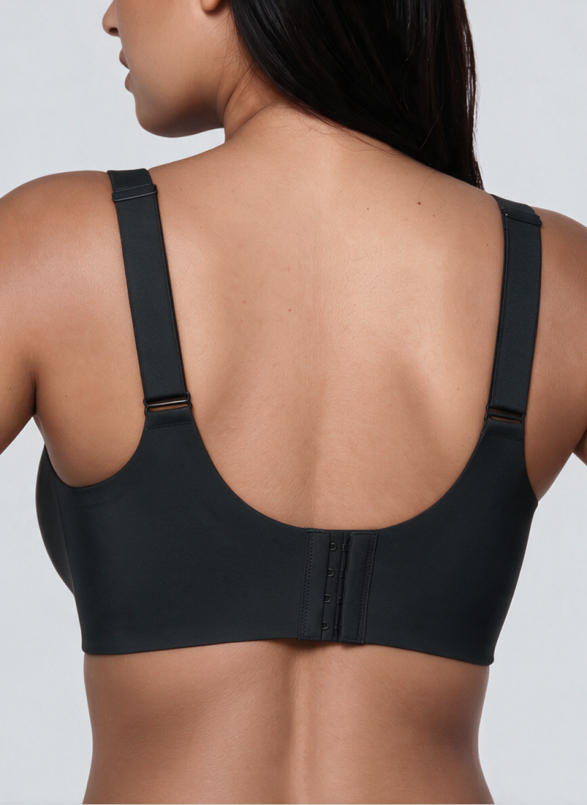 Back view of the black full coverage wireless jelly bra with four hook fastening