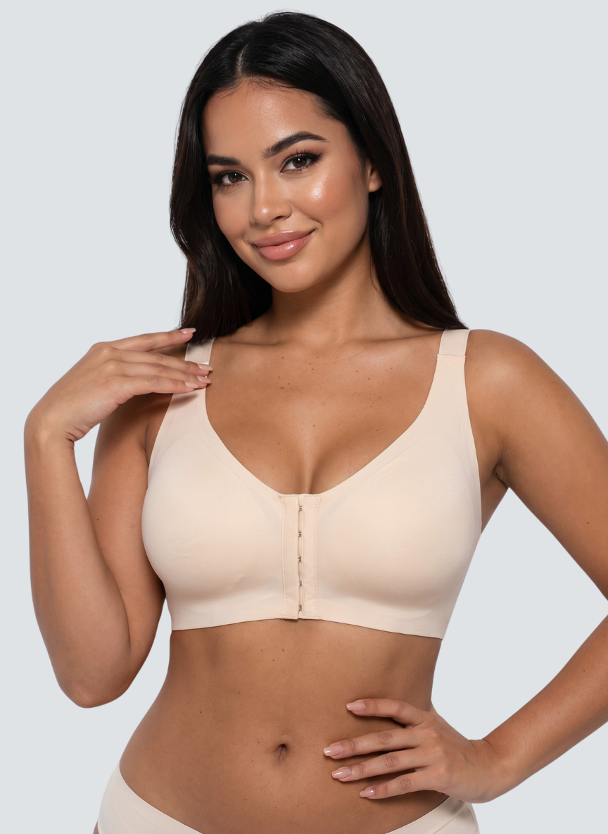 Nude front fastening wireless bra with a row of hooks down the centre
